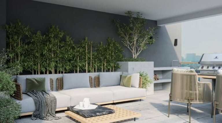 Modern patio with outdoor seating and grill area.